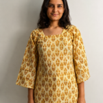 Golden Glow – Yellow Printed Cotton Short Kurti with Bell Sleeves